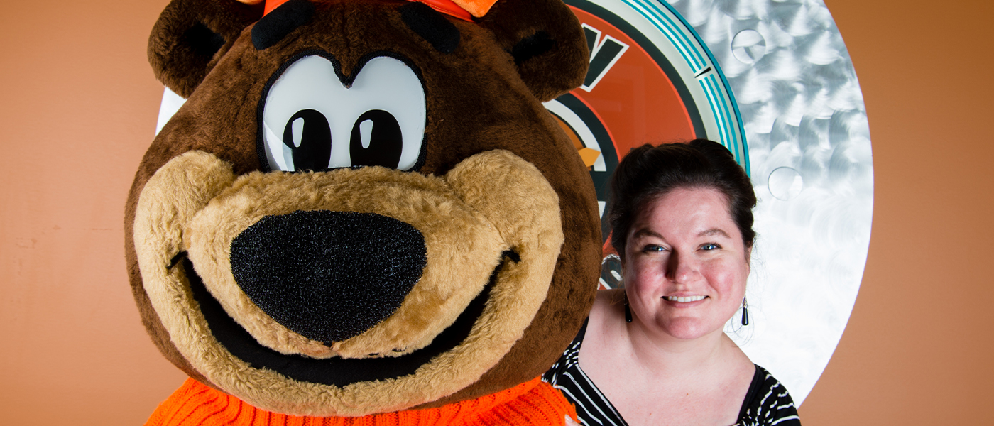 Liz Bazner with Rooty the Great Root Bear